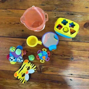 Baby toys: fisher price shape sorter, sassy sensory ball, noise twister ball